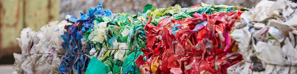 Bales of plastic feedstock for recycling