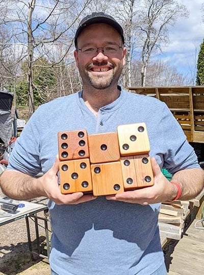 Photo of Matt with woodwork project