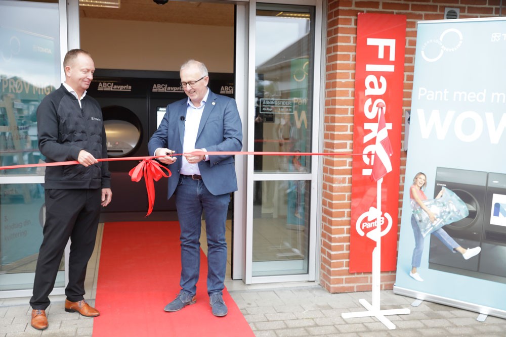 image of two men cutting ribbon