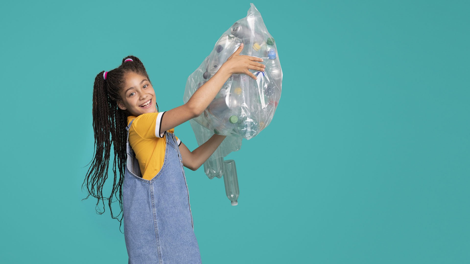 Girl holding a bag of returnables