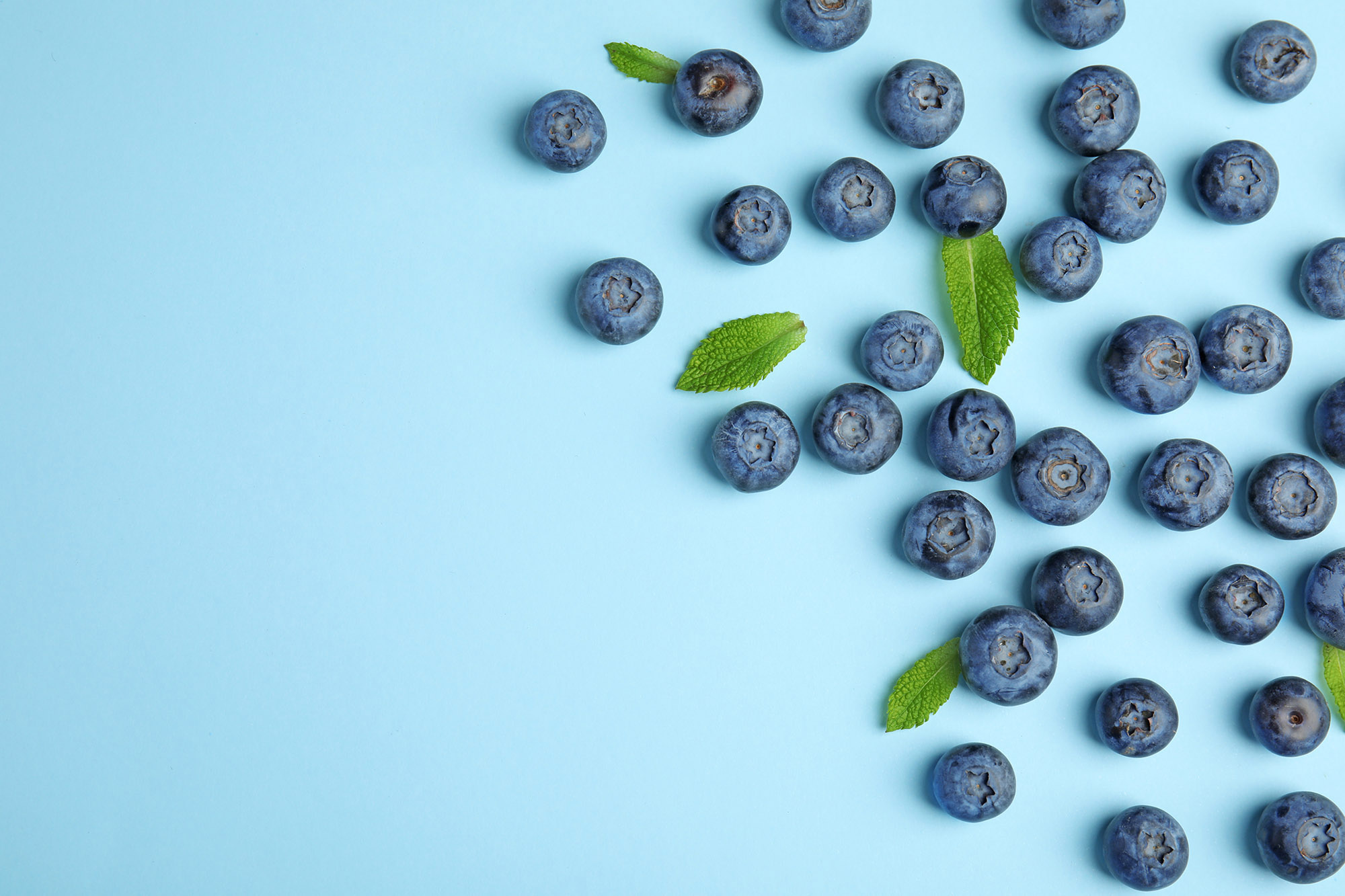 Blueberries on blue table