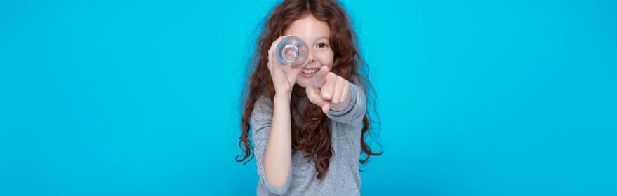 Kid pointing to camera