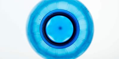 Bottom of empty bottle blue