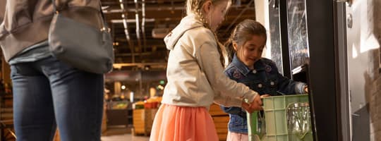 Recyclers return crate of refillable containers