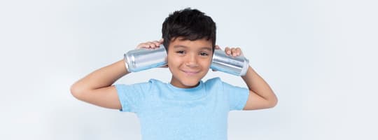 Boy with cans for container materials