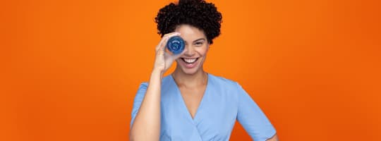 Woman with glass for container materials