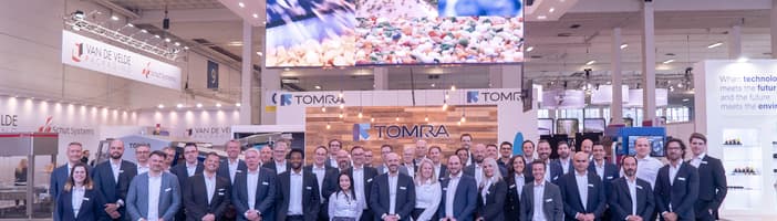 TOMRA-medewerkers op beurs