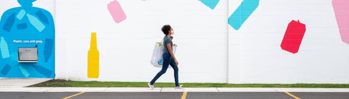 Girl walking in front of the CLR in Buffalo US