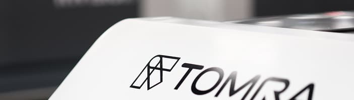 Portion of InVision2 food sorting machine showing TOMRA logo