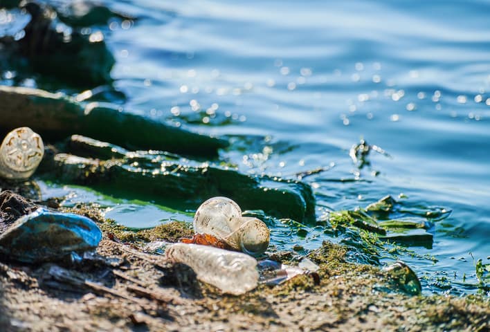 plastic waste washing ashore