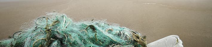 plastic netting washed up on shore