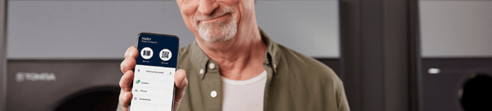 Old man holding phone