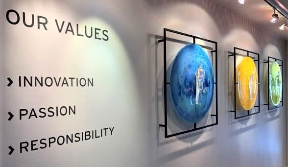 TOMRA values innovation, passion and responsibility on wall