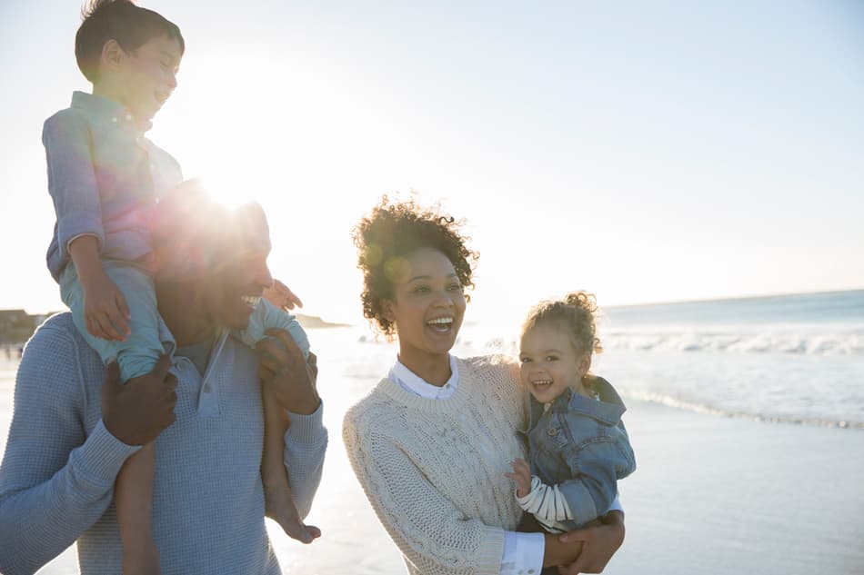 image of family at beach