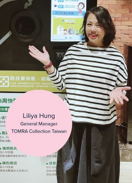 Woman in front of reverse vending machine