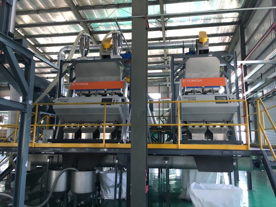Flake sorters in recycling facility in China